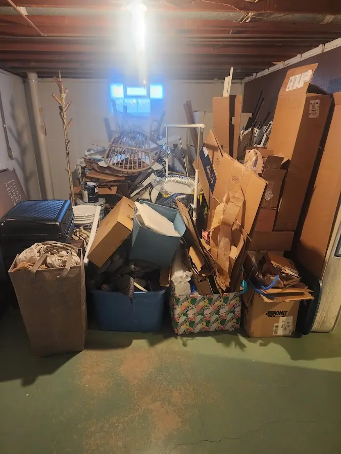 Roll-off dumpster container at job site for Construction Dumpster Rental in Essexville